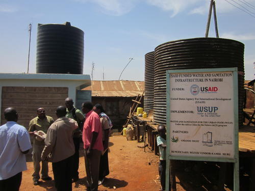 WSUP staff at project site - Visiting water storage tanks in Kibera/Kenya